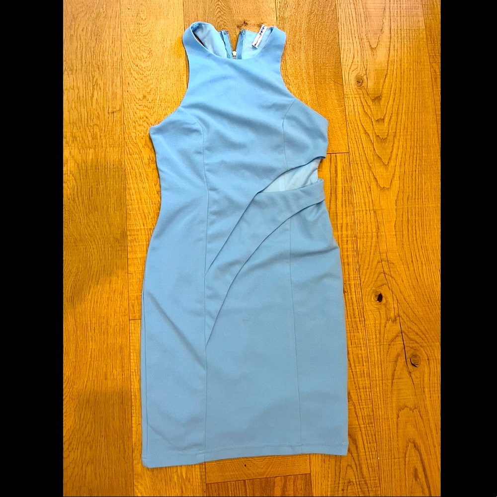 Short baby blue dress, with cutout detail in the front, material has stretch.